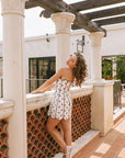 The Coralie Polka Dot Scalloped Mini Dress