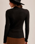 The Kory Black Lettuce Edge Turtleneck Top