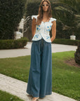 The Livia Scalloped Peplum Top