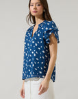 The Odora Dot Ruffle Blouse