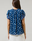 The Odora Dot Ruffle Blouse