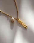The MAMA Pearl Charm Necklace