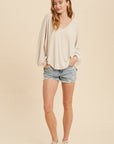 The Oatmeal Cherie Hacci Knit V-Neck Top