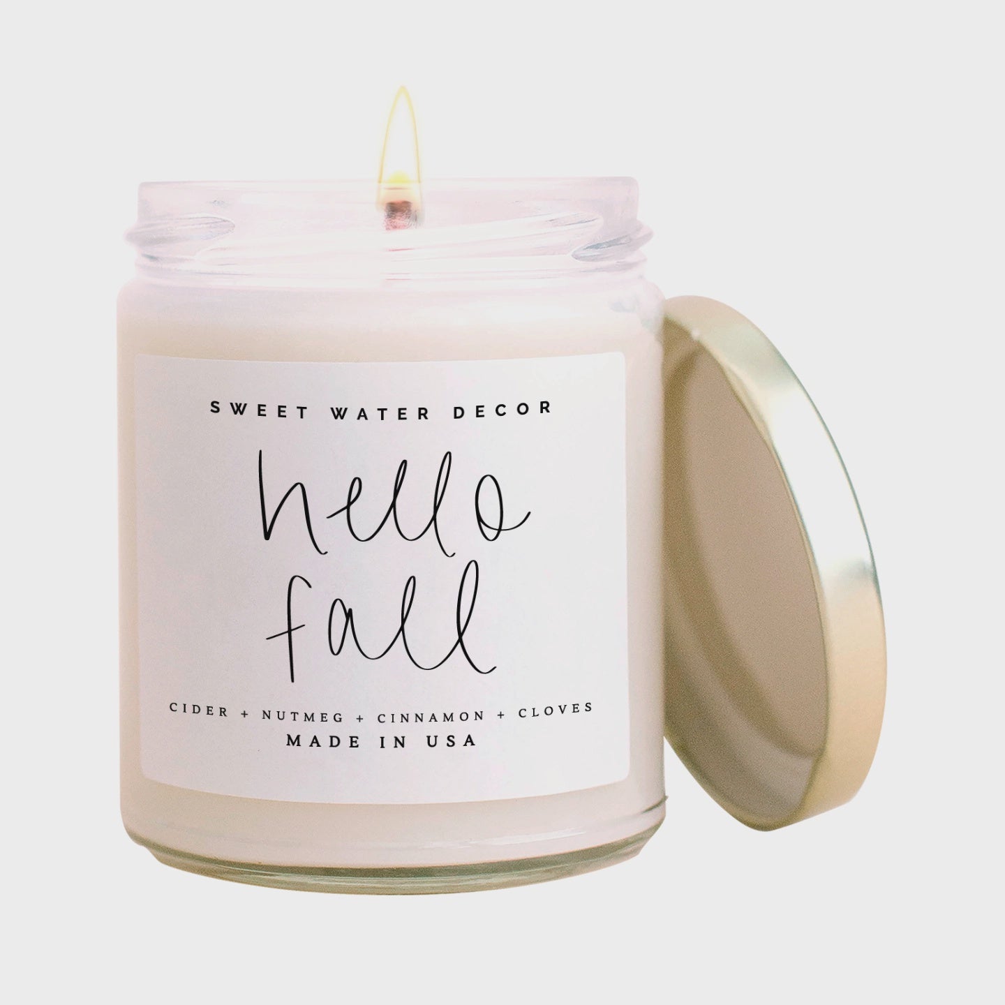 The Hello Fall Soy Candle in Clear Jar by Sweet Water Decor