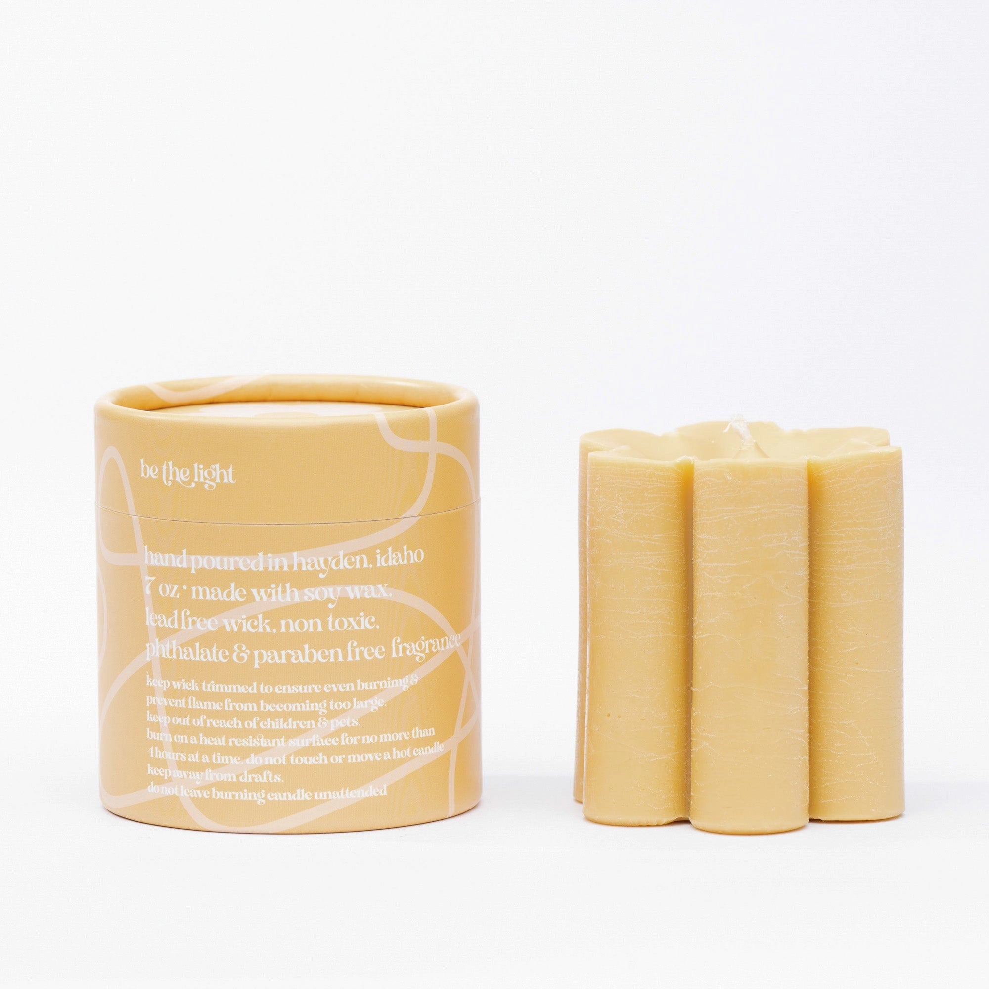 The Ochre Daisy Pillar Candle by Ginger June Candle Co.
