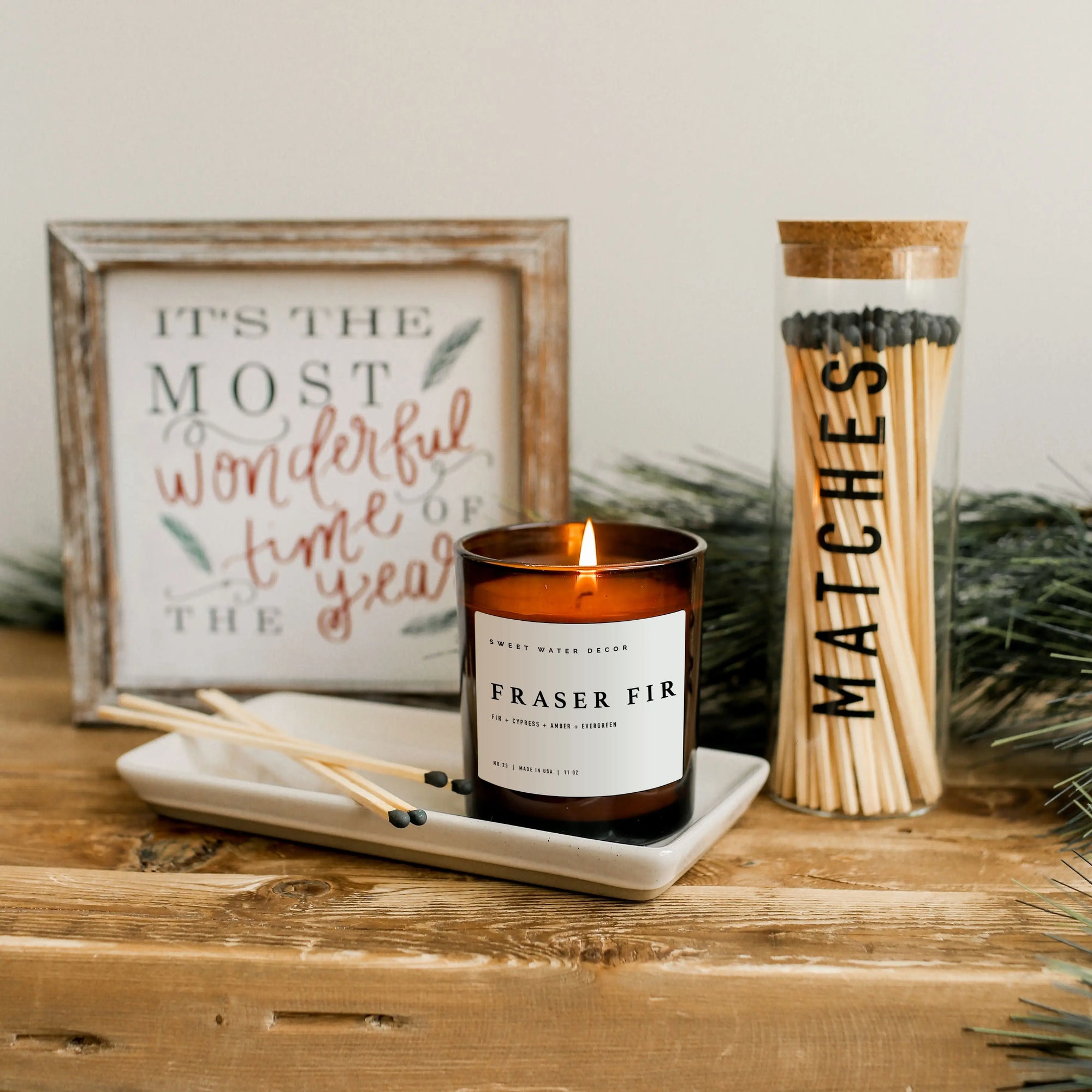 The Fraser Fir Soy Candle in Amber Jar by Sweet Water Decor