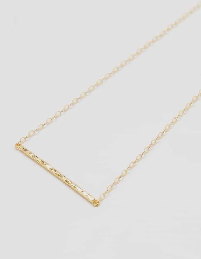 The Gold Thin Hammered Bar Necklace by Admiral Row