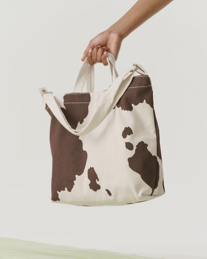 The Brown Cow Horizontal Duck Bag by Baggu