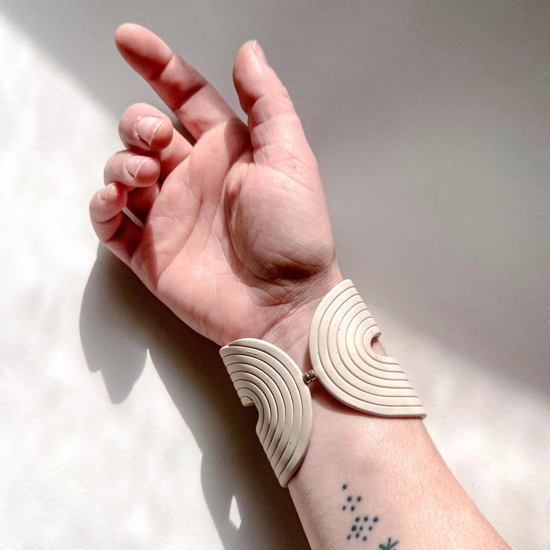 Saturn Clay Cuff by Little Pieces Jewelry
